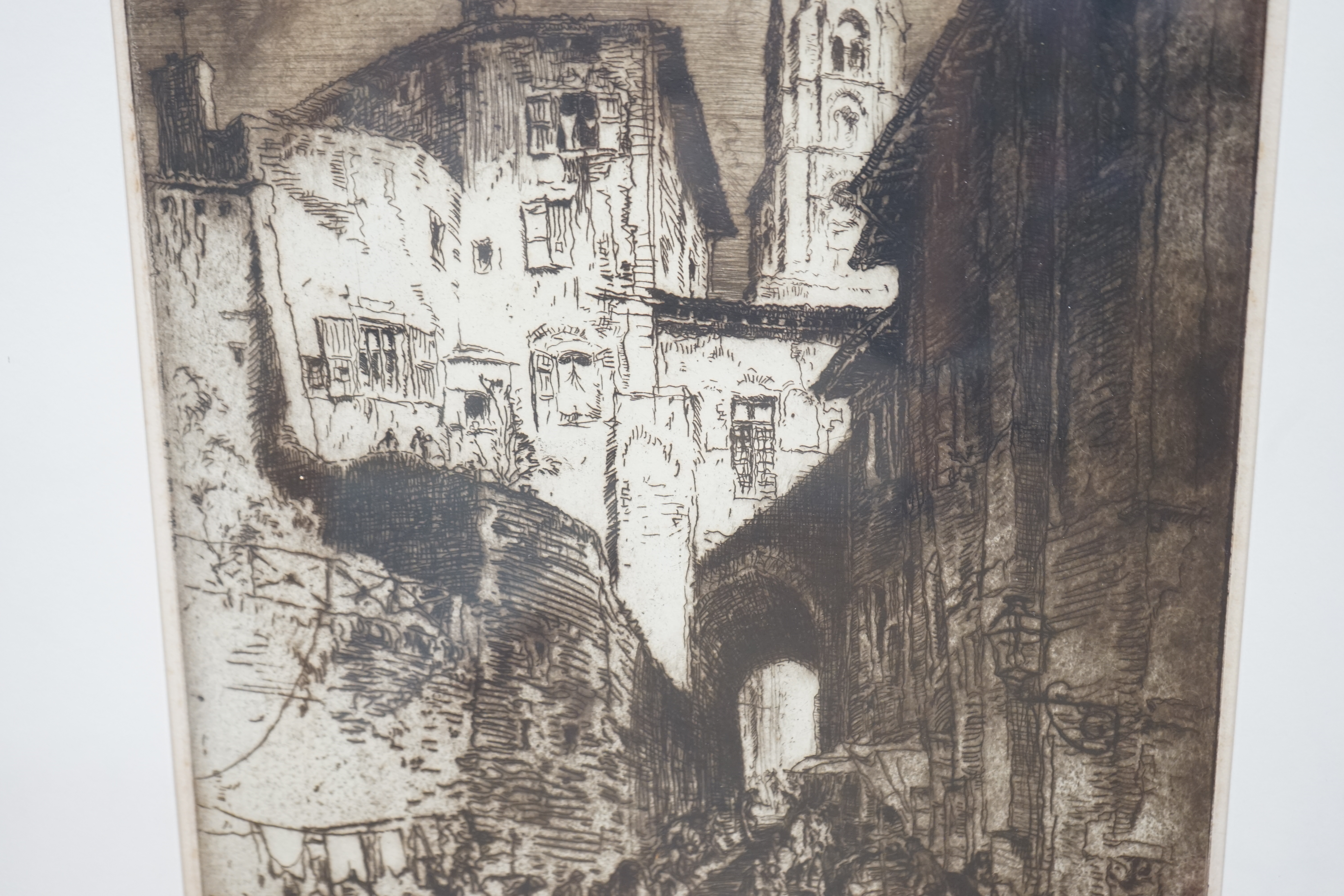 Frank Brangwyn (Welsh, 1867-1956), lithograph and etching, Street scenes with buildings, each signed in pencil, largest 42 x 31cm. Condition - poor to fair, discolouration and rippling to the paper